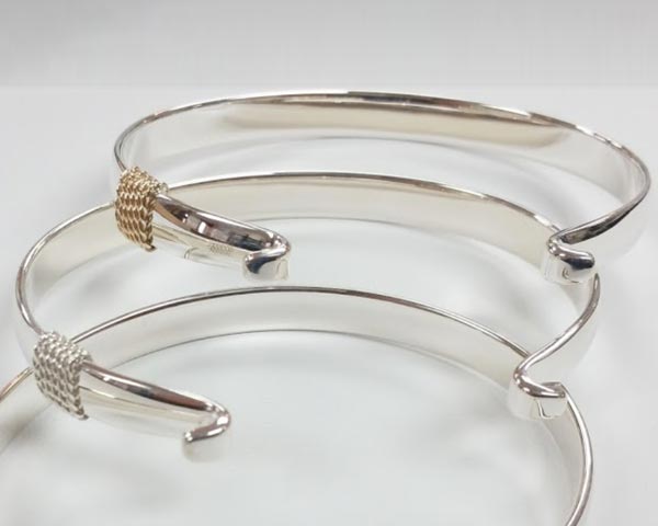 Three Le Stage convertible bracelets without clasps